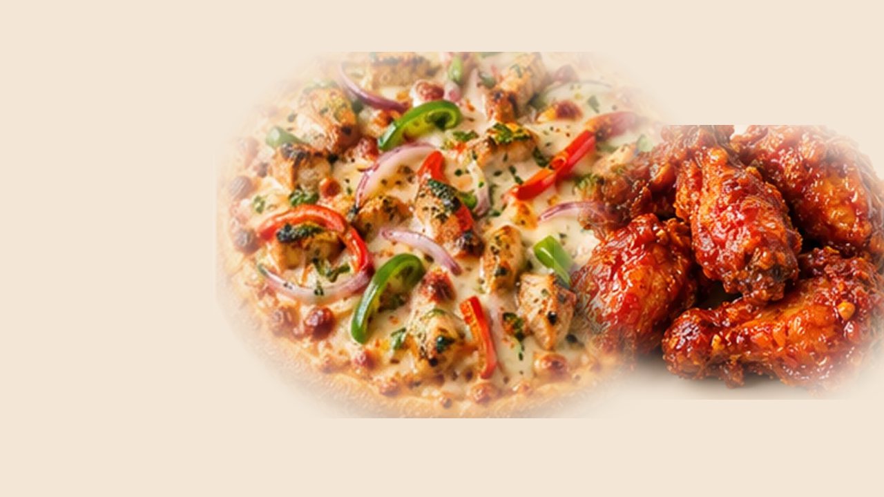A large pizza and hot wings.